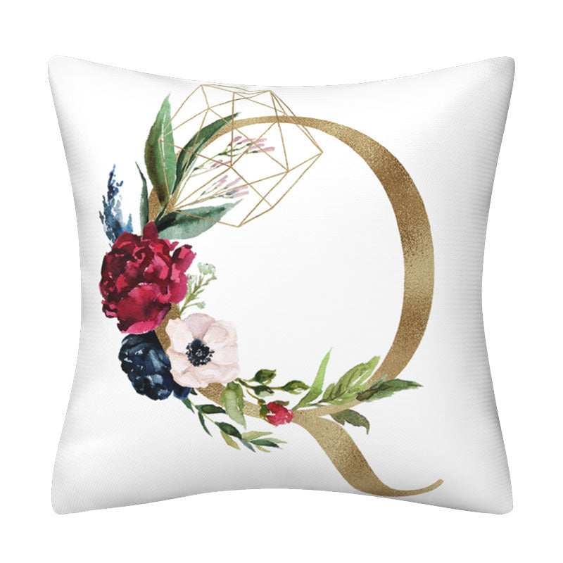 Pillowcase in white polyester with a large gold English Alphabet letter Q, floral bouquet and fine geometric accents.