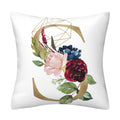 Pillowcase with a white polyester cover, gold geometric letter and colorful floral print featuring an English Alphabet motif.