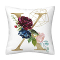 Pillowcase in white polyester with a gold English Alphabet letter, geometric outline and colorful floral print.