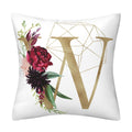 Pillowcase in white polyester with burgundy floral print and a large gold geometric English Alphabet letter V.