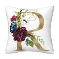 Pillowcase with a white polyester surface, featuring a large gold English Alphabet letter R and colorful floral print.