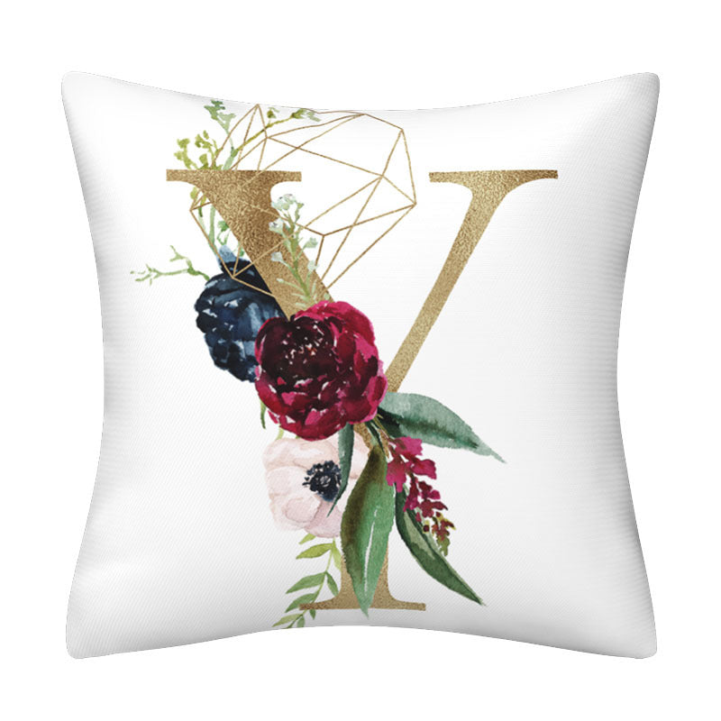 Pillowcase in white polyester with gold geometric English Alphabet lettering, accented by colorful flowers, berries and green leaves.