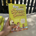 Children Educational Story Books, a yellow paper-covered book with bold Street Smart lettering and colorful cartoon children on the cover.