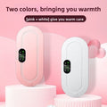 Adjustable Heating Belt with rounded pink and white pads, stitched oval borders, black digital controls and button clasps