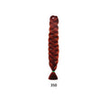 African Box Braids in a single long, thick auburn-red synthetic braid with a tightly woven pattern and tied end