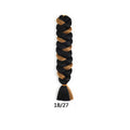 African Box Braids synthetic hair extension in a thick black and caramel-brown braid with a loose tapered end