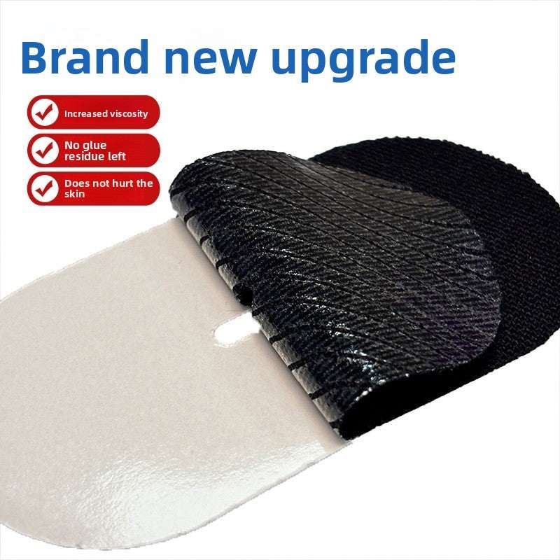 Anti Snoring Mouth Tape in black and white cotton, showing a textured adhesive surface and rounded shape
