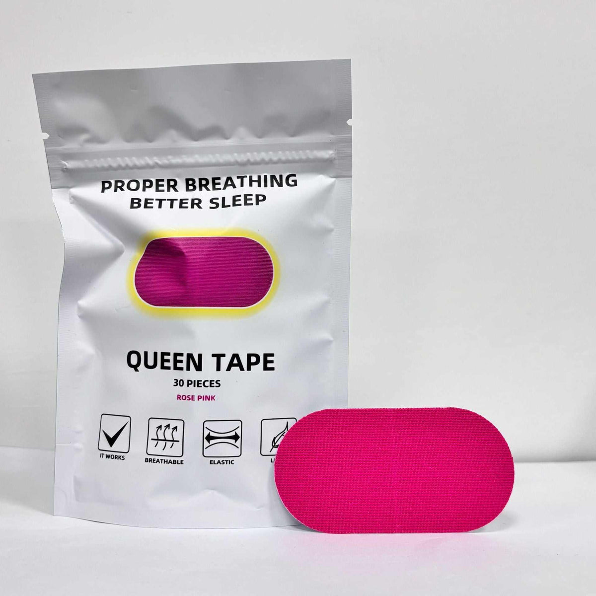 Anti Snoring Mouth Tape in rose pink cotton, shown as a rounded rectangular strip beside a matching pouch.
