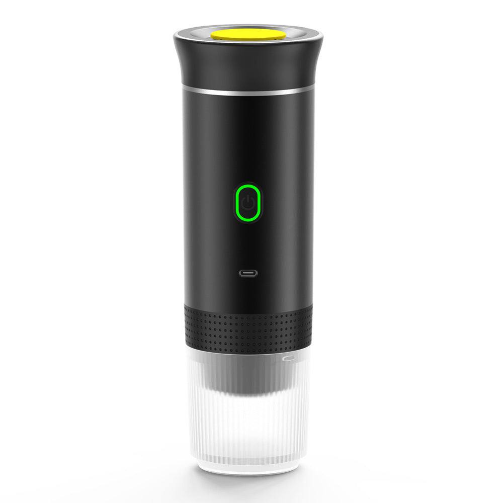 Automatic Capsule Espresso maker in black plastic with a cylindrical body, green-lit button, yellow top detail, and clear ribbed base