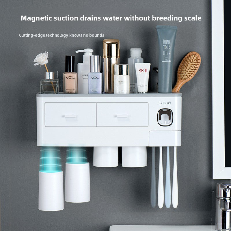 Automatic Wall Mount Toothpaste Dispenser in white plastic, with two drawers, a sensor button, twin toothpaste cups and toothbrush slots.