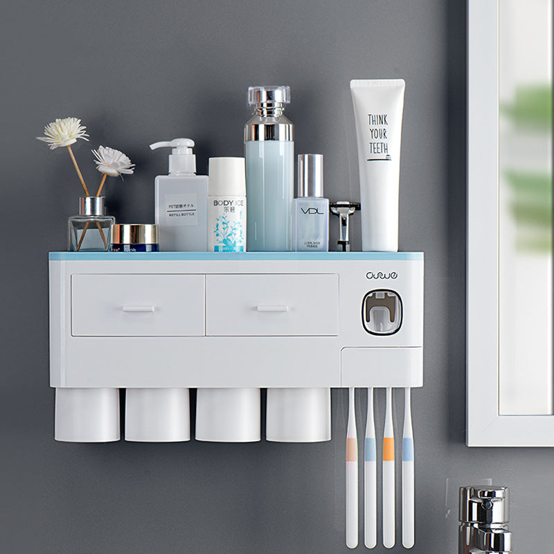 Automatic Wall Mount Toothpaste Dispenser in white plastic, with two drawers, a sensor button, twin toothpaste cups and toothbrush slots.