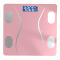 Bluetooth Rechargeable Body Fat Scale in pink glass with four silver sensor pads and a blue digital display