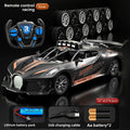 Bugatti Style kids remote control car in silver and charcoal with orange racing stripes, sporty body, and matching controller