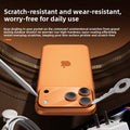 Camera lens protective film shown as three dark circular covers on an orange phone camera module, with scratch-resistant coating
