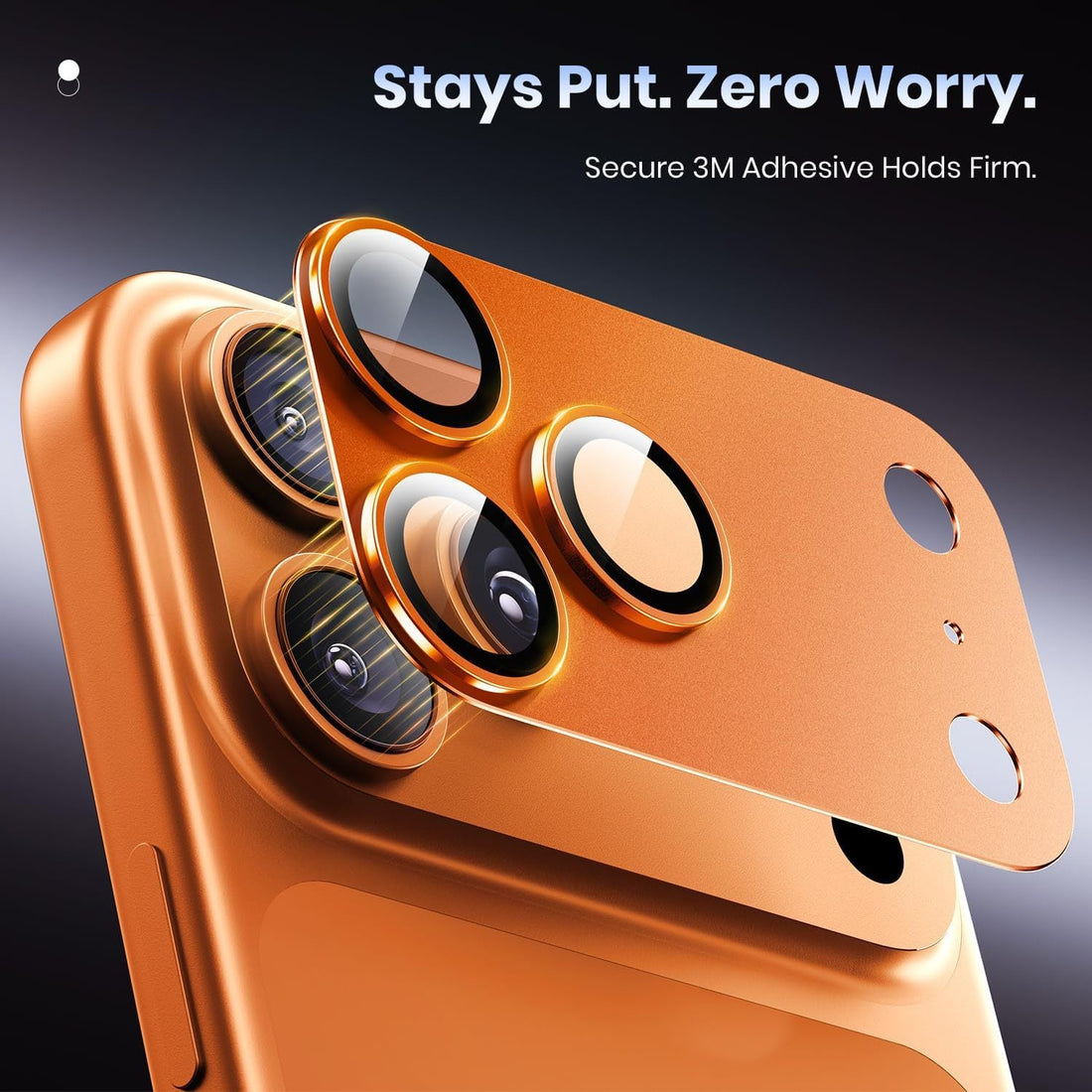 Camera lens protective film in orange tempered glass with a matte finish, featuring raised circular openings for camera lenses.