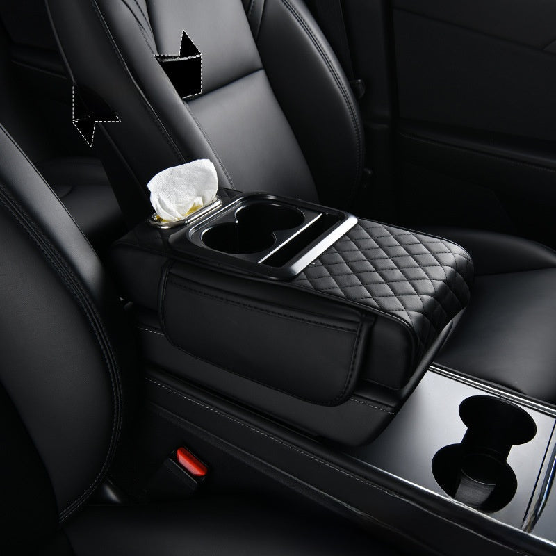 Car-mounted tissue box in black quilted leather with a tissue slot, padded armrest, and integrated dual cup holders