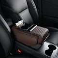 Car-mounted tissue box in brown leather with diamond quilting, a tissue opening, cup holder and padded armrest
