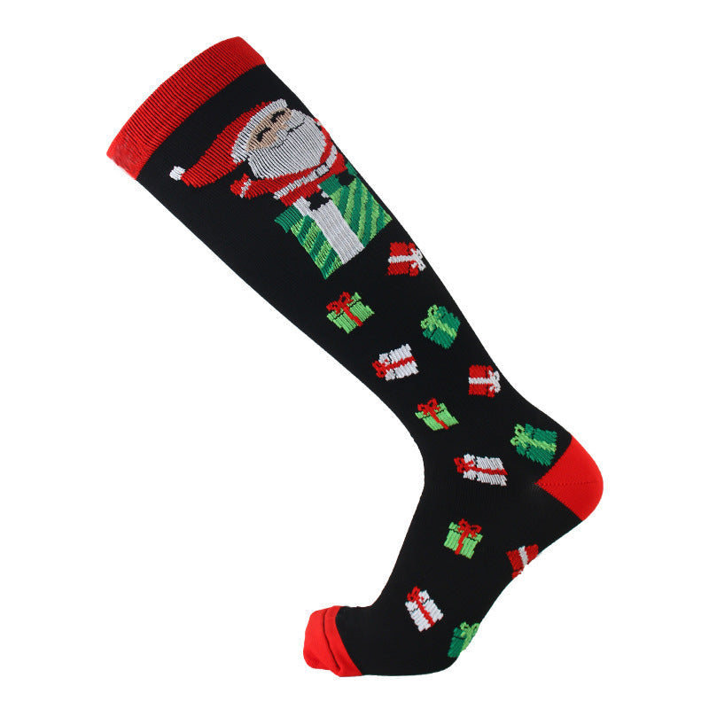 Christmas Compression Socks in black stretch knit with red cuffs and Santa, gift and holiday motifs.