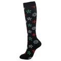 Christmas Compression Socks in black stretch fabric with a mid-calf fit and scattered red, green, white, and blue snowflakes