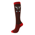 Christmas Compression Socks in dark brown with red accents, featuring a festive reindeer face and striped foot