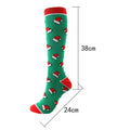Christmas Compression Socks in green knit fabric with repeating Santa hat pattern and bright red cuffs, heel and toe