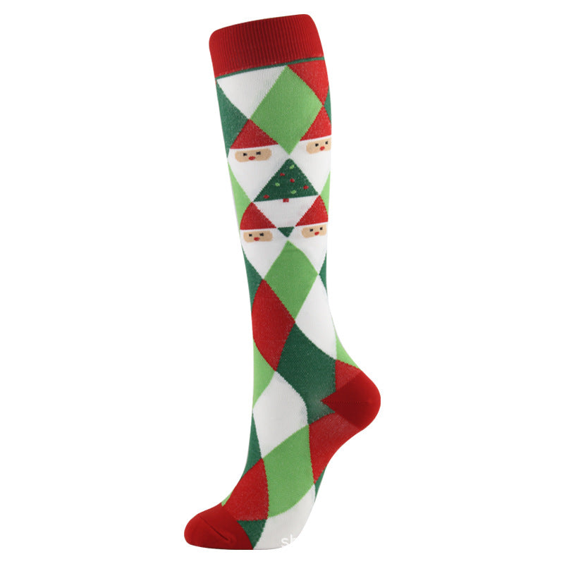 Christmas Compression Socks in red, green, and white with a bold argyle pattern and small festive face motifs
