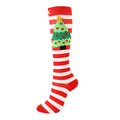 Christmas Compression Socks with red and white stripes, a green Christmas tree motif, and a ribbed red cuff