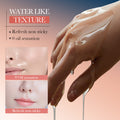 Cleaning face dissolving make-up cleansing oil with clear, glossy water-like texture shown stretching between fingers, nonsticky feel