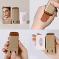 Concealer Foundation Liquid Stick in a beige rectangular case with a brown cream stick, shown with its box and swatched on skin