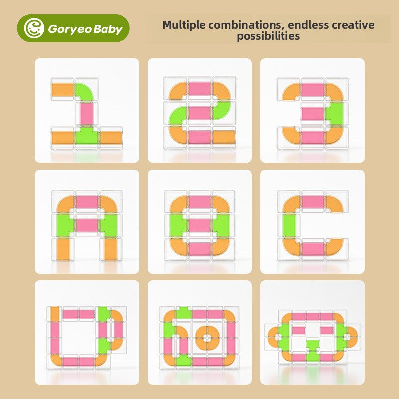 Creative Pipe Building Blocks featuring clear plastic cube pieces with bright pink, green and orange curved track inserts for rolling balls.