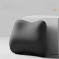 Cushion to prevent buttock pain in solid dark gray memory foam, with a contoured ergonomic shape and raised sides