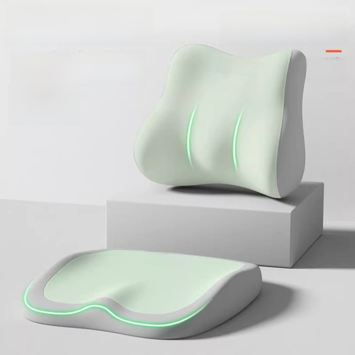 Cushion to prevent buttock pain in pale mint with solid smooth covering, contoured seat pad and matching lumbar support cushion