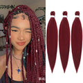 Dirty Braids Fluffy Wig in burgundy synthetic hair, styled in long chunky braids with small decorative beads
