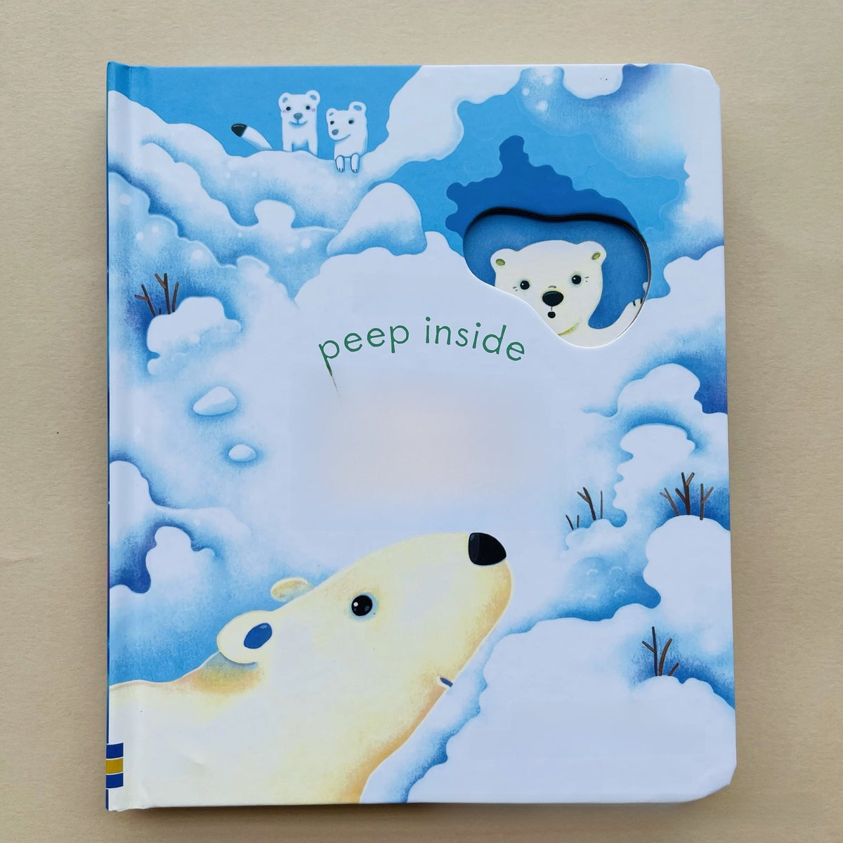 Educational  Picture Books toddler book, blue snowy cover with white polar bears and a peek-through bear face window, titled “Peep Inside”