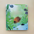Educational  Picture Books board book with a green underwater scene, colorful sea creatures, bubbles, and a peek-through beetle-shaped cutout.