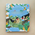 Peek-through Educational  Picture Books with a sturdy blue cover, colorful leaves, and a bird family in a nest
