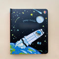 Educational  Picture Books board book with a navy space-themed cover, colorful stars, rocket ship, and peek-through window.