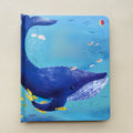 Board book with a blue underwater whale illustration, small fish and jellyfish, featuring rounded corners; Educational  Picture Books for toddlers
