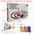 Electric Domino Train Toy featuring a cherry pink plastic train and colorful dominoes in a boxed 160-piece set