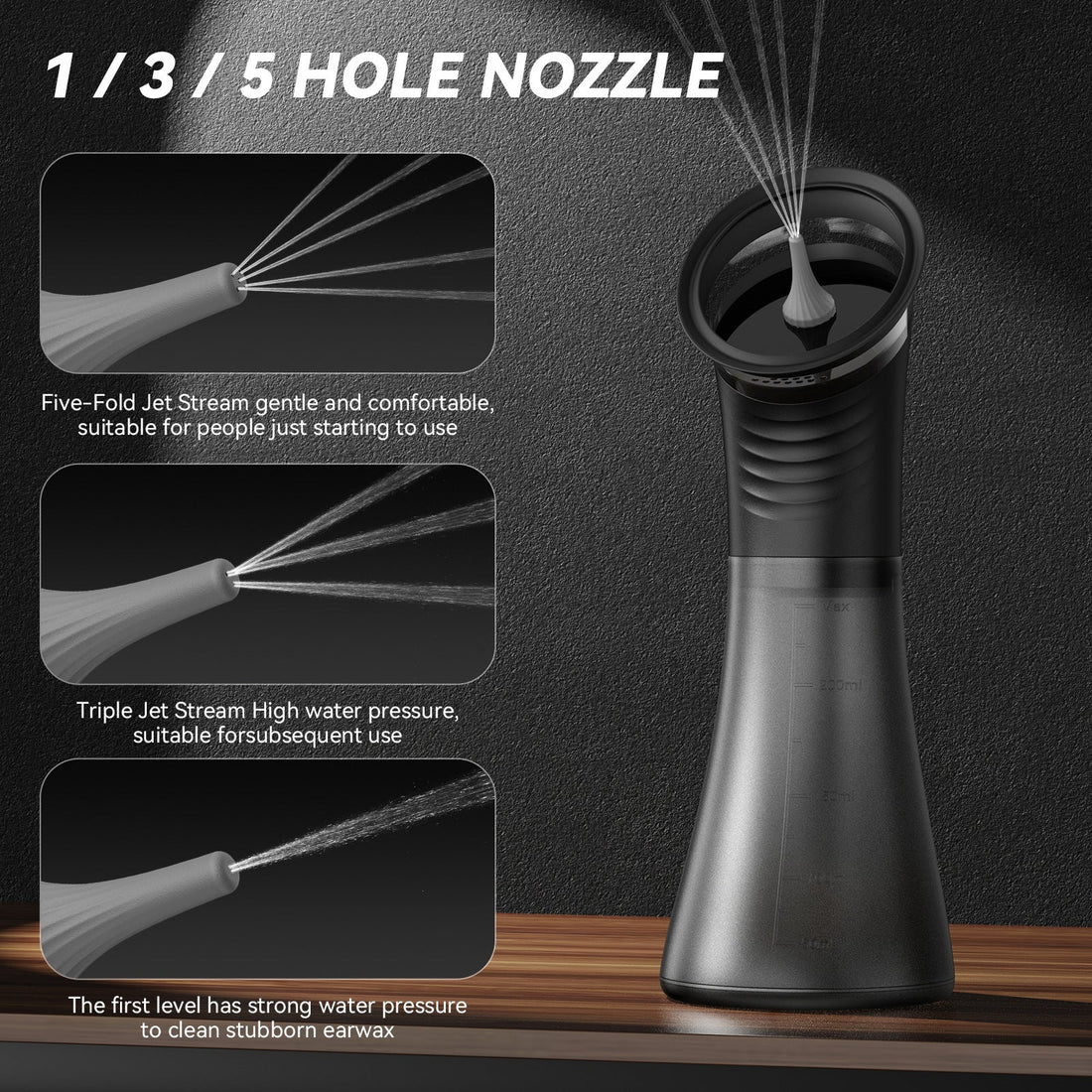 Electric Ear Cleaning Irrigator in silver and black with a ribbed handle, water-spray nozzle, spare tips and USB cable
