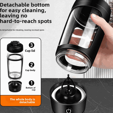 Electric Protein Shaker Cup with a clear plastic body, black lid and motorized base, featuring a detachable three-part design.