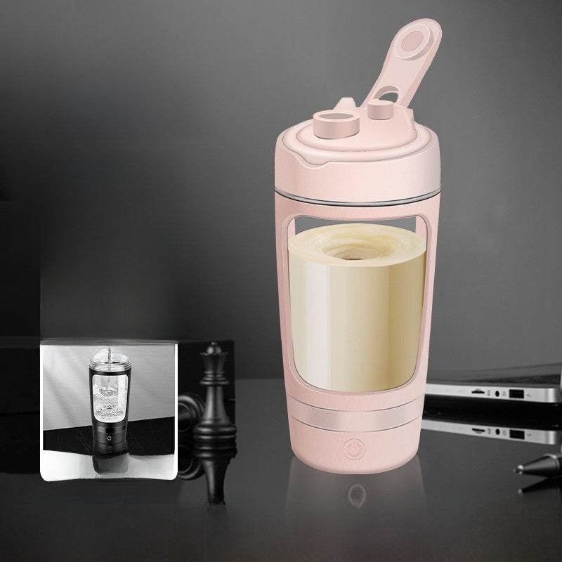 Electric Protein Shaker Cup in pale pink with a clear body, cream-colored drink, flip-top lid, and carry loop