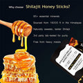 Energy Supplement honey sticks with golden honey, a honey dipper, honeycomb, and dark Shilajit stick packaging