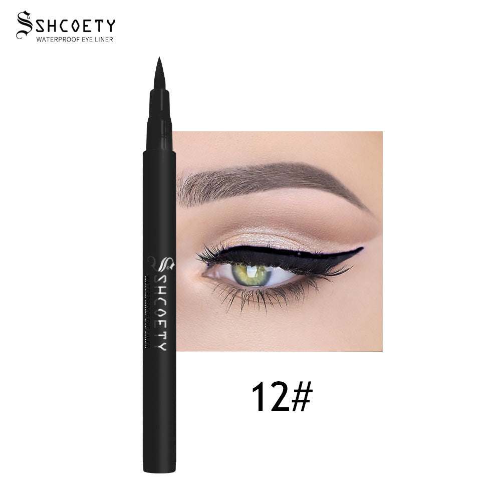 Eyeliner Pen Waterproof in a slim black matte barrel with a pointed felt tip, shown with a bold winged eye look