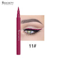 Eyeliner Pen Waterproof with a slim magenta barrel and pointed tip, shown beside a bold pink winged eye line.