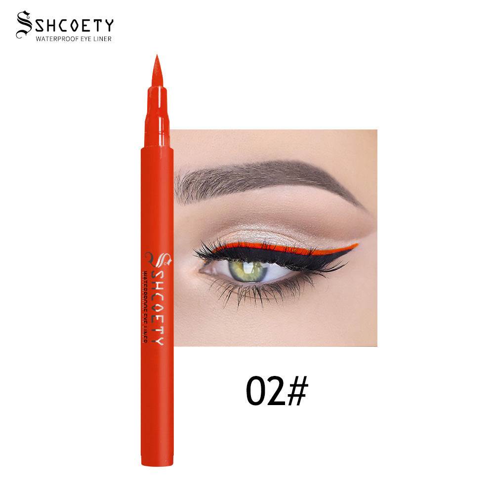 Eyeliner Pen Waterproof in bright orange-red with a fine felt tip, shown beside a dramatic matching orange winged eye look.
