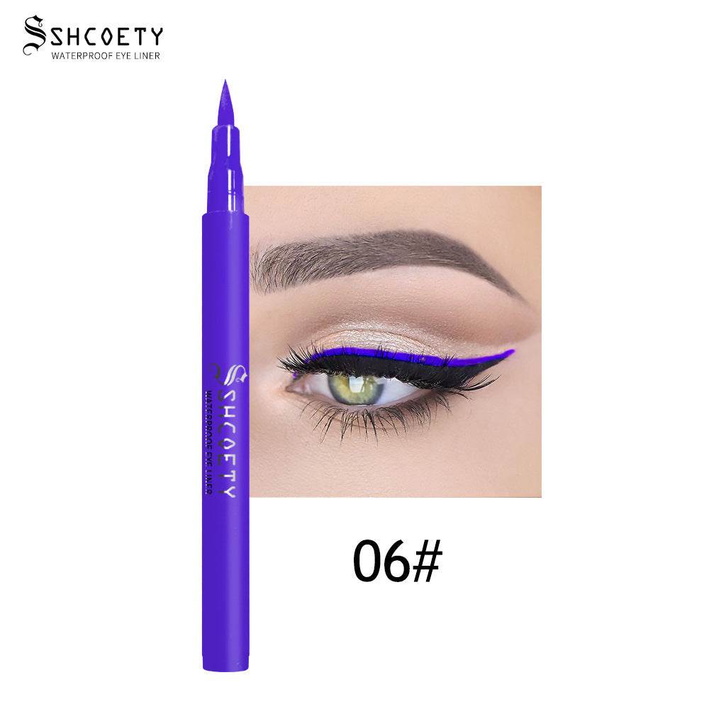 Eyeliner Pen Waterproof with a vivid purple barrel, fine pointed tip and matching purple winged liner swatch.