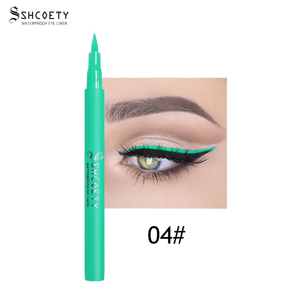 Eyeliner Pen Waterproof in a bright turquoise matte barrel with a fine tip, shown with a matching vivid green eye line.