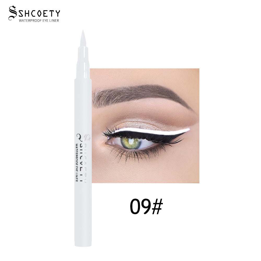 Eyeliner Pen Waterproof in a white slim pen with a pointed tip, shown creating a bold white winged line on an eye
