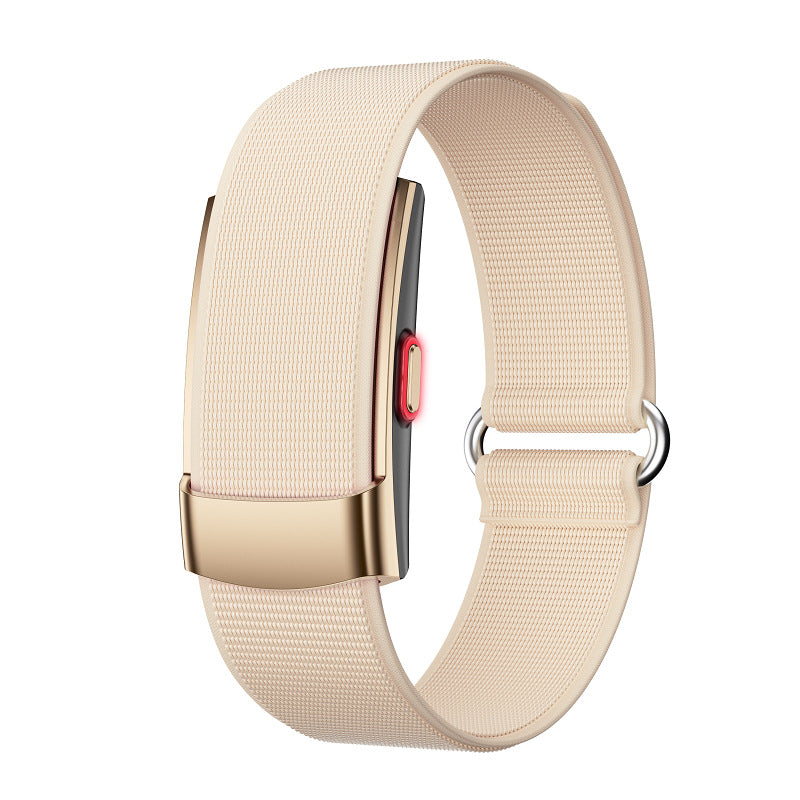 Fitness Monitor with a pale beige textured woven strap, gold-toned rectangular clasp, and slim dark tracker body